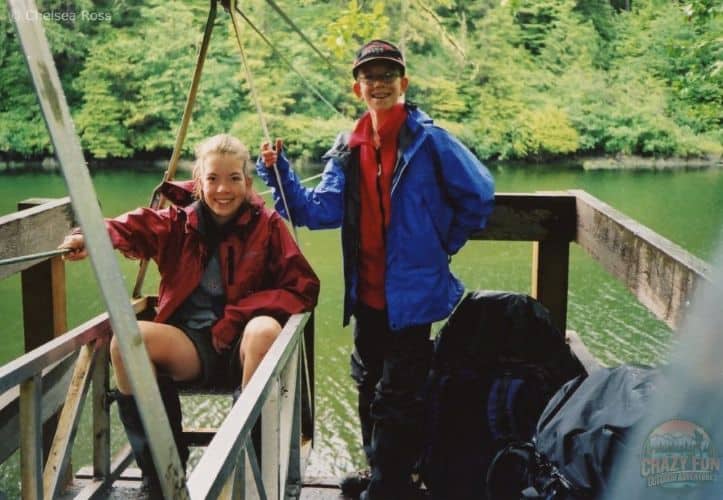 Girl in a cable car with boy beside me backpacking the West Coast Trail