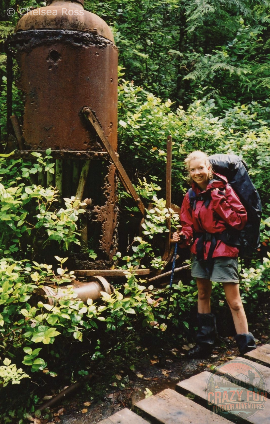 West Coast Trail tips: look for an old Donkey in the forest. Here a girl is standing beside it.
