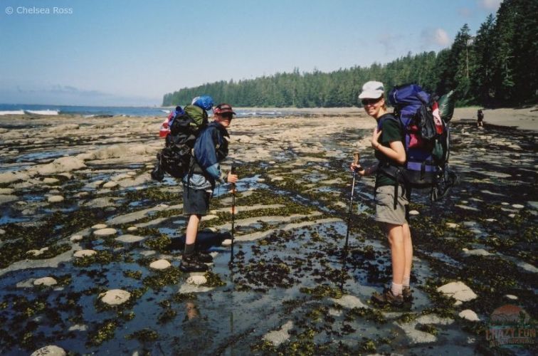 Scott and I proudly wearing the Canadian Flag for Canada Day as we backpack on the beach.