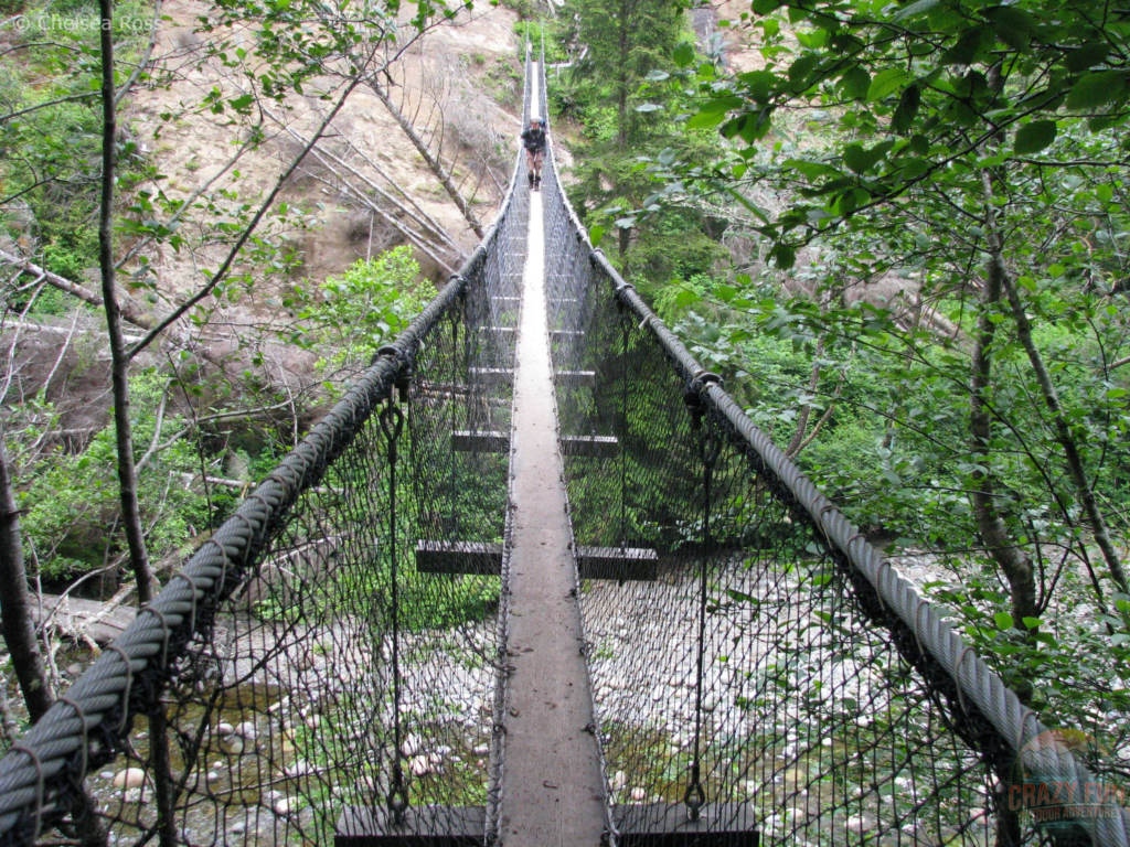 My brother crossing a suspension bridge
