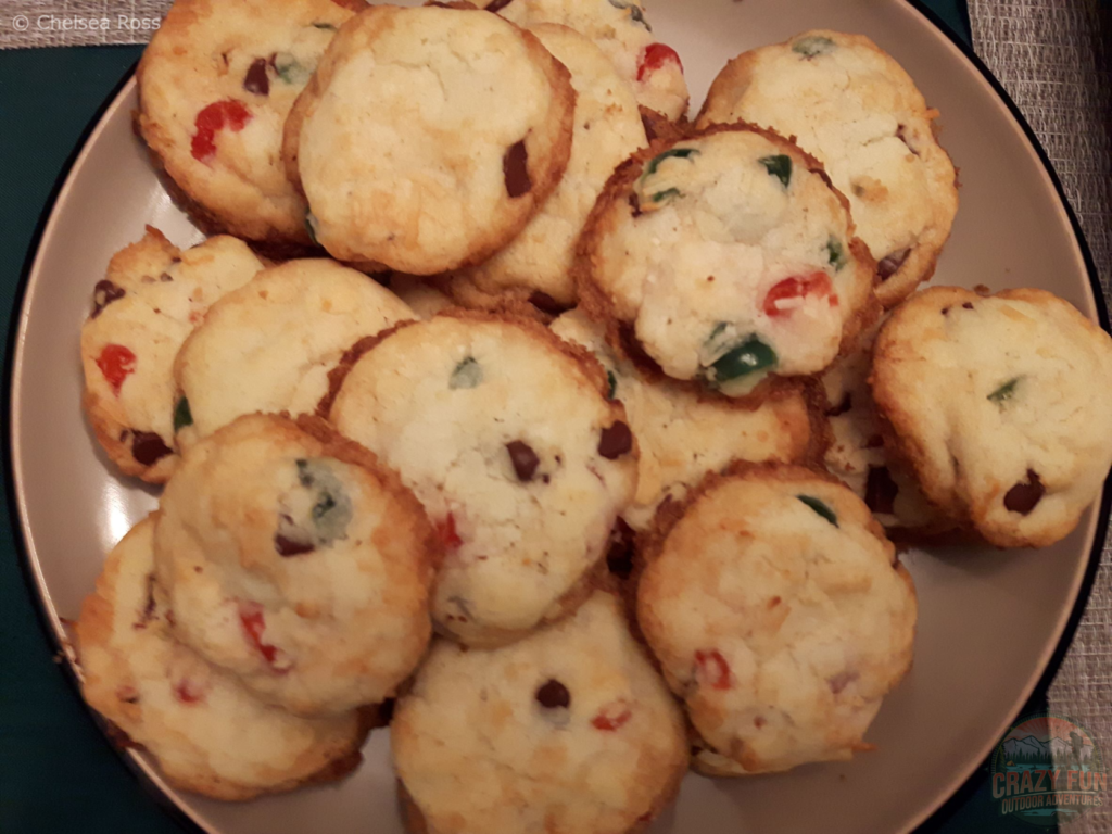 Chocolate Chip Cherry Cookies made from red and green cherries, chocolate chips sit in a plate. They are first on the Top 8 Christmas Desserts to make.