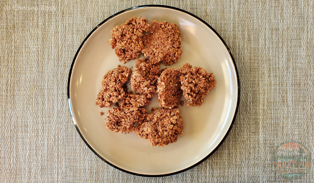 Chocolate Oatmeal Drops made of cocoa and oatmeal sit on the plate. They are second on the Top 8 Christmas Desserts to make.