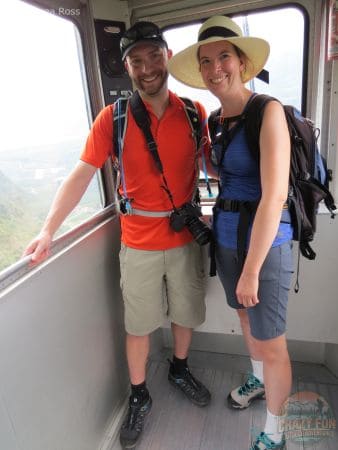 Man and women heading down the Vilpian-Mölten Cable car.