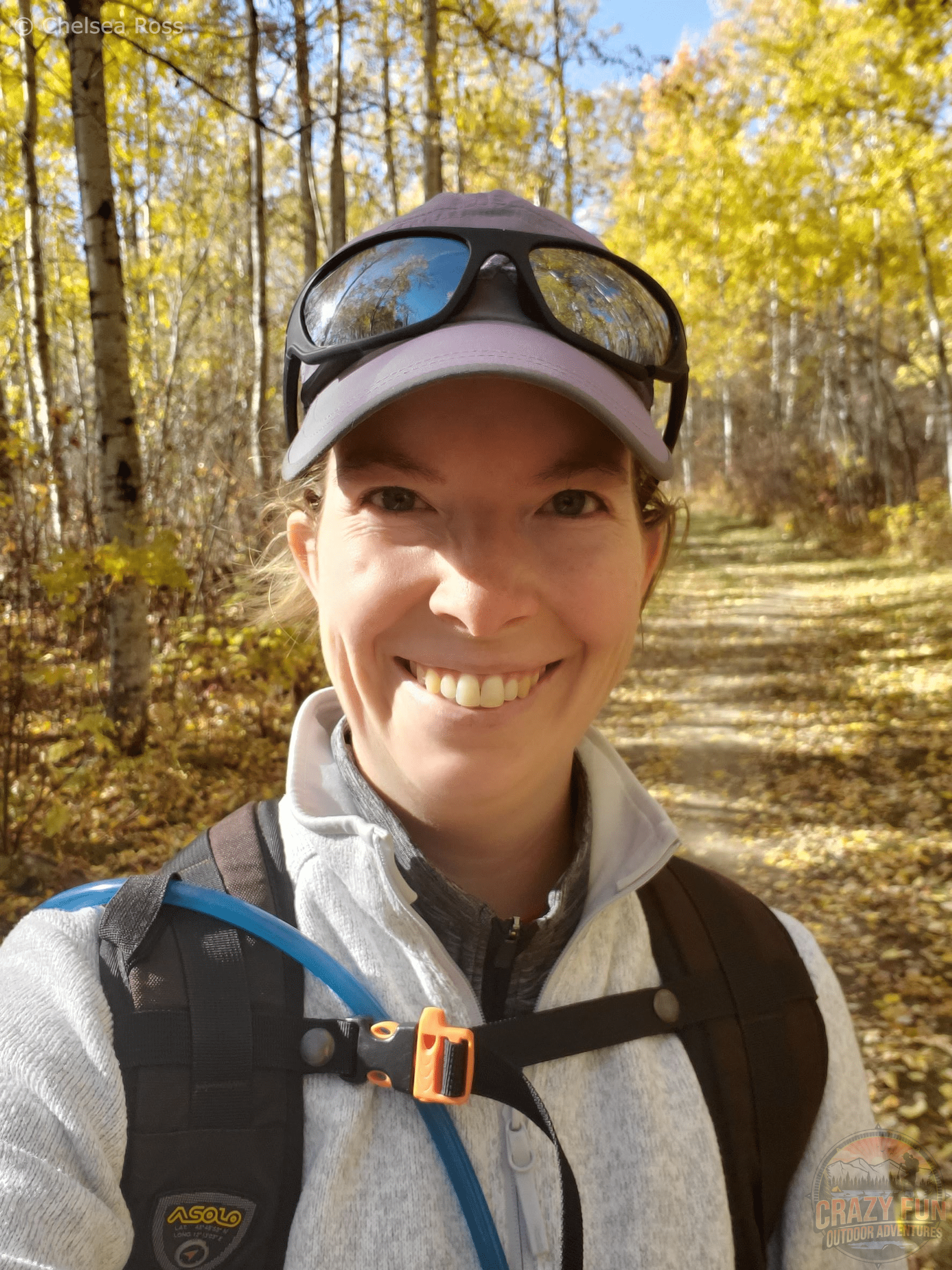 Focus on What Matters: Hiking in the fall surrounded by yellow leaves.