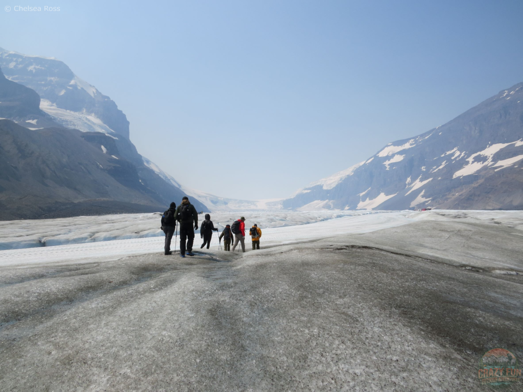 Athabasca Glacier Hike: Our group is being guided up the glacier. The snow road can be seen in front, where the Ice Explorer rides to get to the top. 