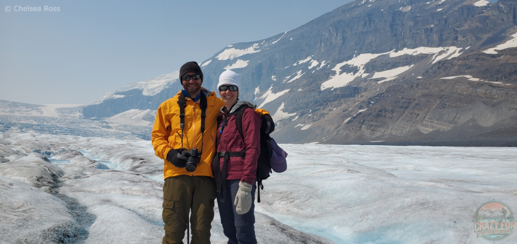 A gorgeous day to be doing Athabasca Glacier Hike. Kris and I are looking at the camera in our yellow and maroon jacket. 