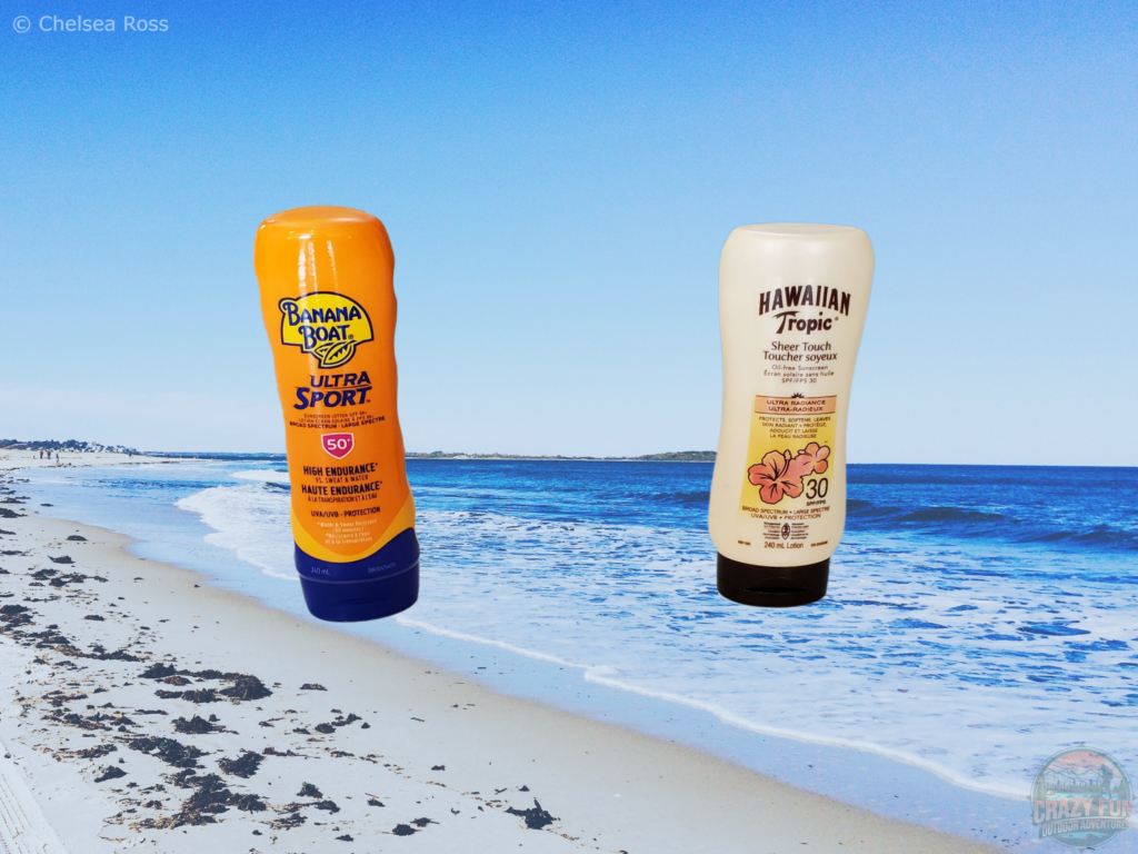 SPF 50 orange bottle to the left with an SPF sunscreen beige bottle 30 to the right with a beach and water background. 
