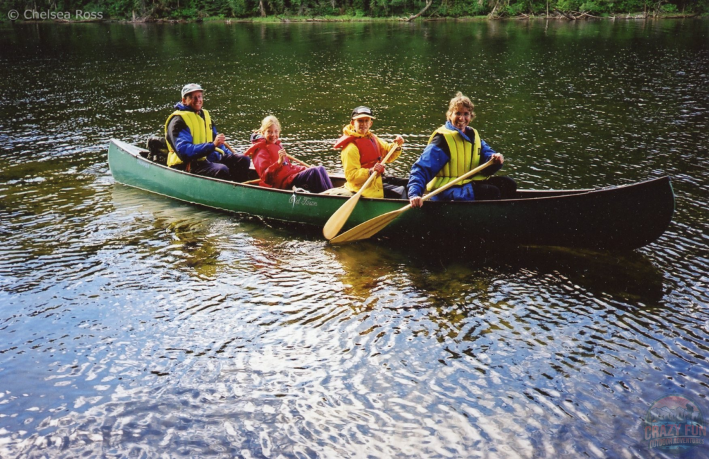 My family and I sitting in a canoe on the Bowron Lakes.