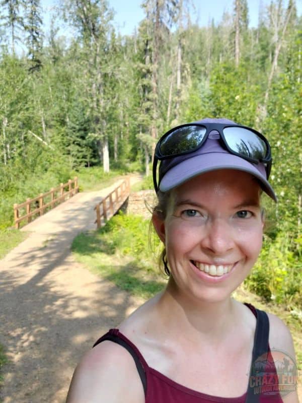A selfie of a lady walking on the Birchwood hiking trails in Fort McMurray.