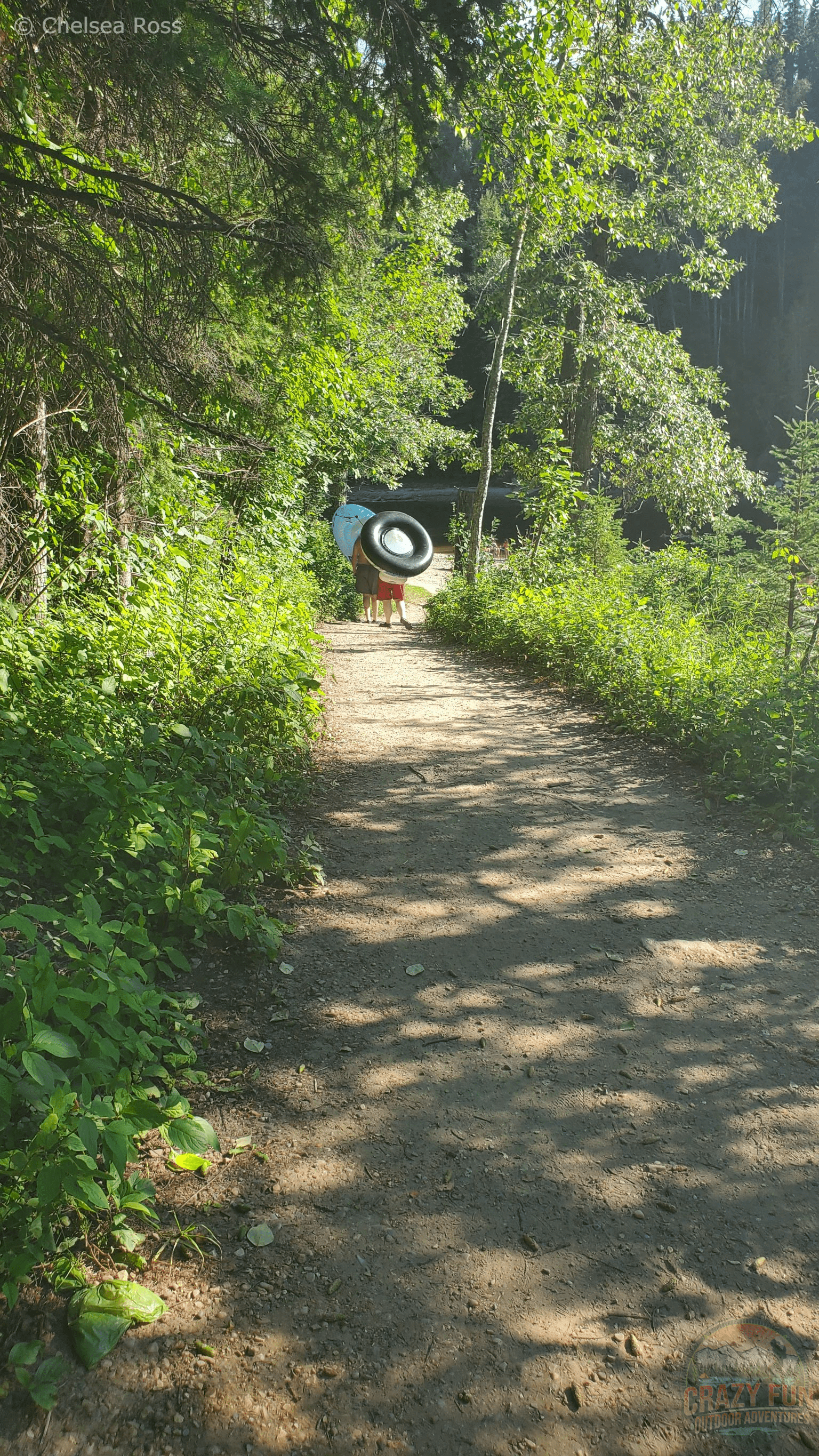 A large path to take down to the river. Tubers can be seen in front.