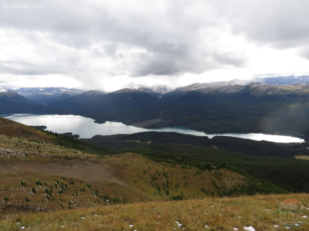 A picture of Maligne Lake down below.