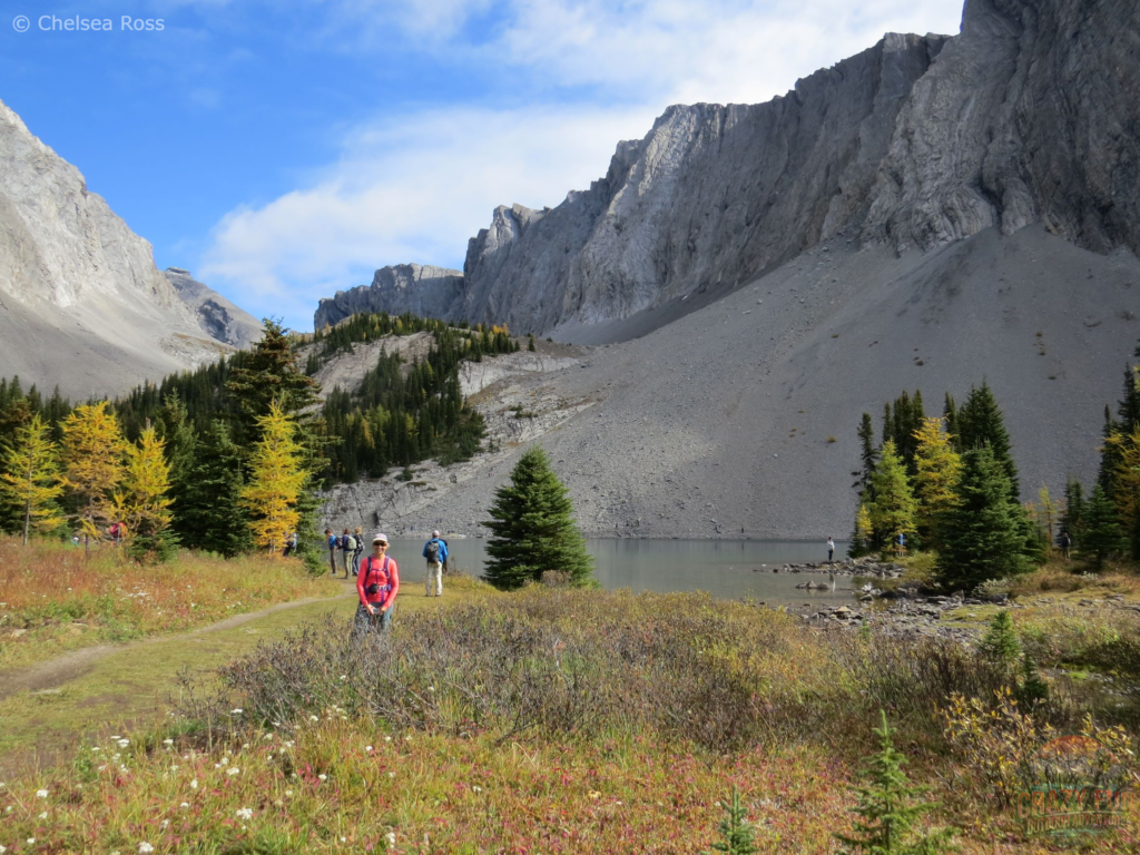 The best larch hikes include Chester Lake that can be seen in the background with my mom wearing a pink shirt.