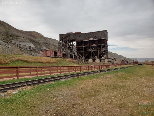 Looking at a wooden Tipple at the mine.