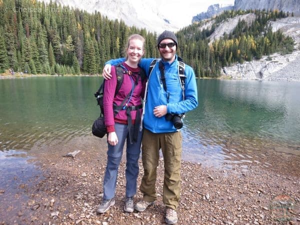 Man in blue and lady in purple in front of Chester Lake.