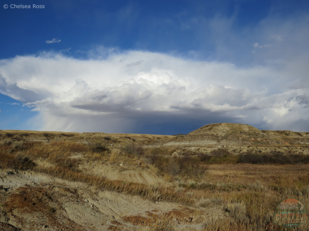 Showing the Drumheller foothills with a storm in the back.