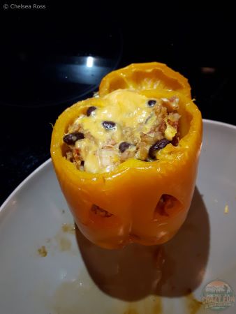 Looking inside the Jack o' lantern orange pepper. 