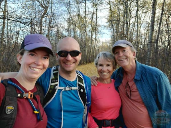 A family selfie during a fall hike.