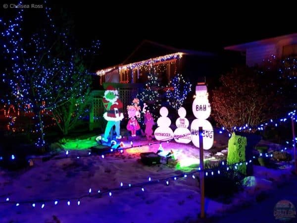 Edmonton Events at Christmas include Candy Cane Lane. The Grinch and snowman are in front of a house.