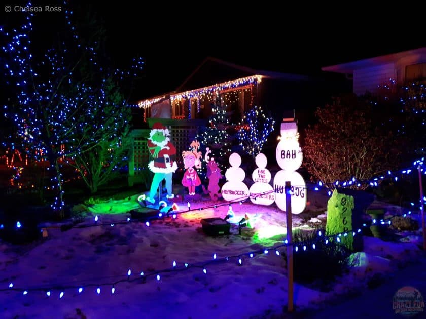 Edmonton Events at Christmas include Candy Cane Lane. The Grinch and snowman are in front of a house.