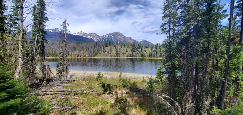 Approaching Wabasso lake with the mountains behind.
