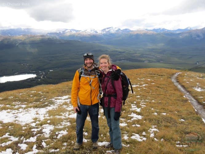 Best Jasper hikes include Opal Hills. A couple standing at the top of Opal hills.
