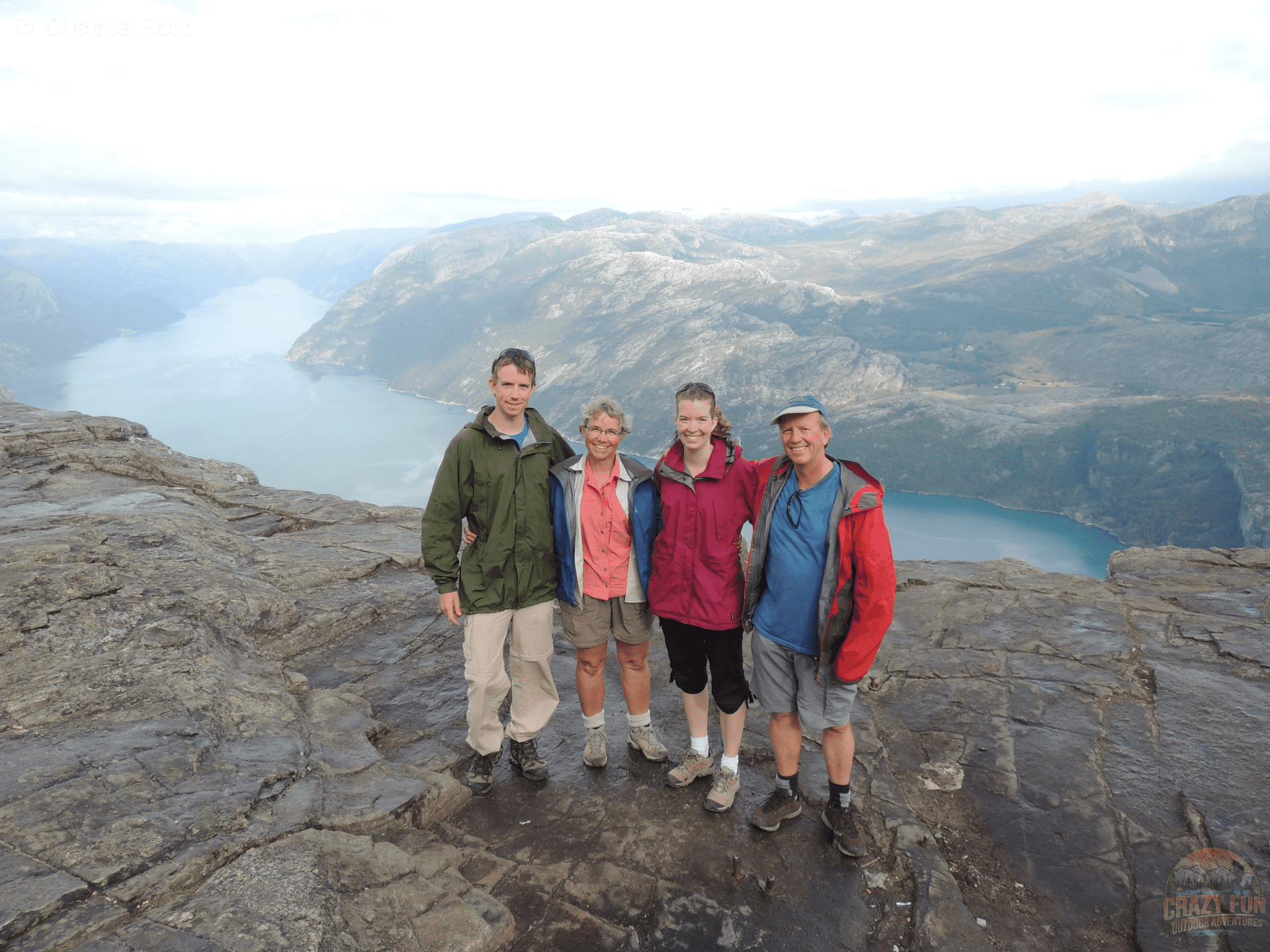 Presume outdoor competence in kids. This is a picture of my family and I on Preikestolen in Norway.