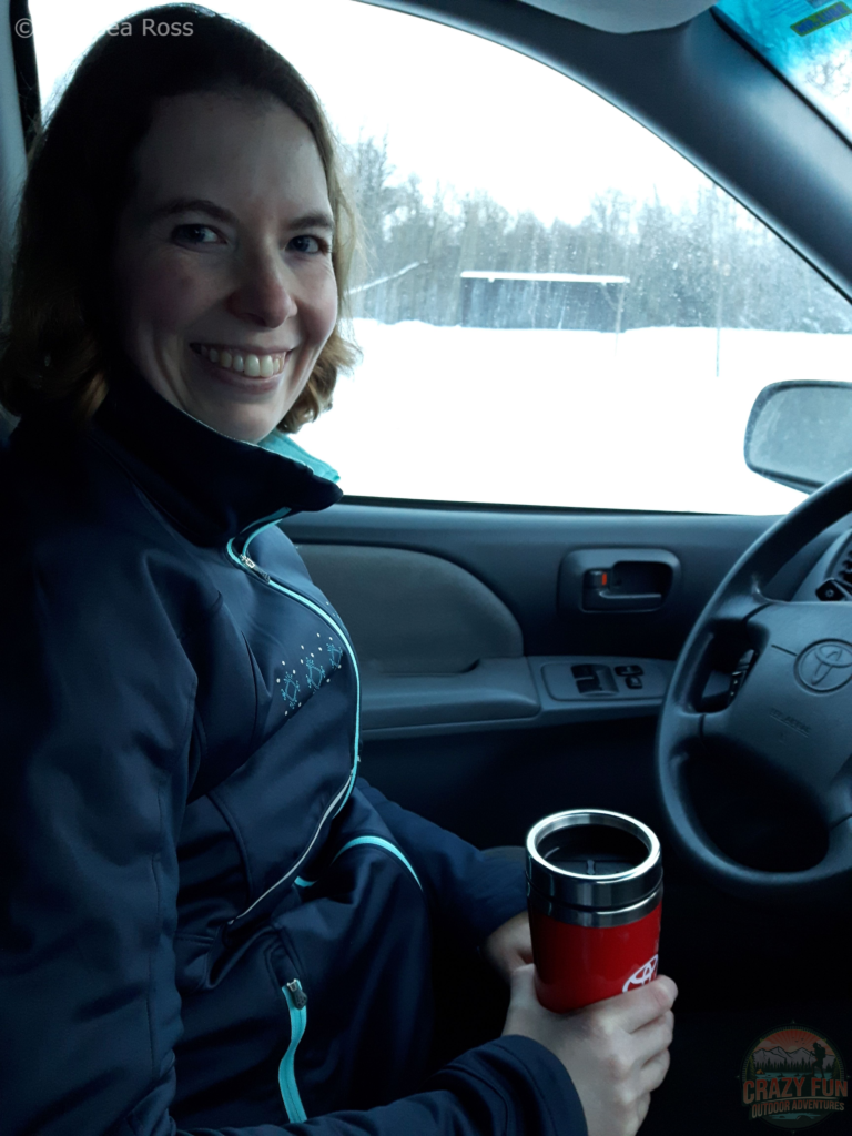 Drinking hot chocolate in the vehicle.