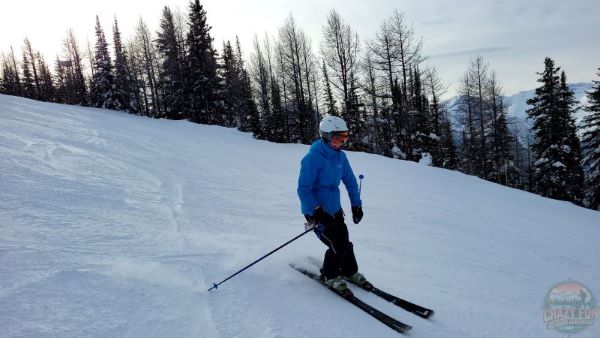 Ways to spend time outdoors is by going downhill skiing. 