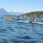 Get better at kayaking by going further distances. Kris and I are kayaking on the ocean at Desolation sound.