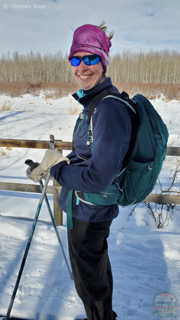 Showing the backpack while xc skiing.