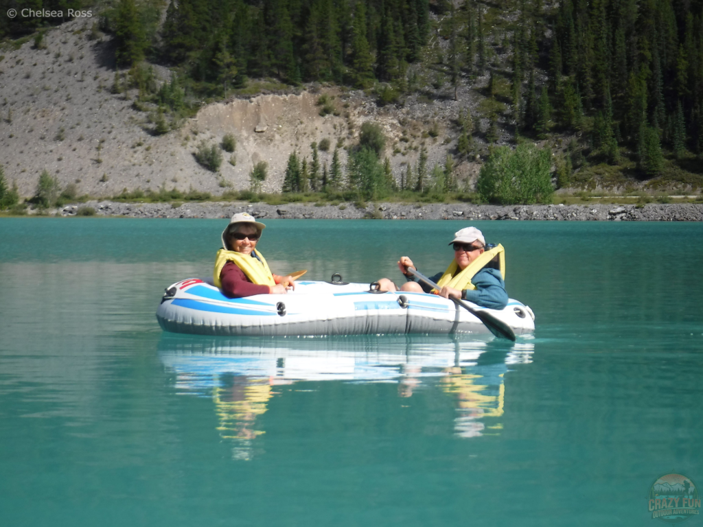 Unique Camping Alberta: My parents in a raft on Waterfowl Lakes.