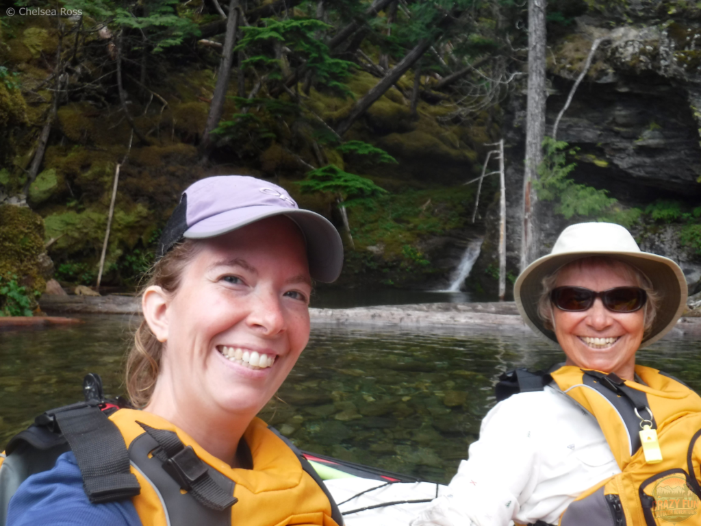 Selfie of two women kayaking.