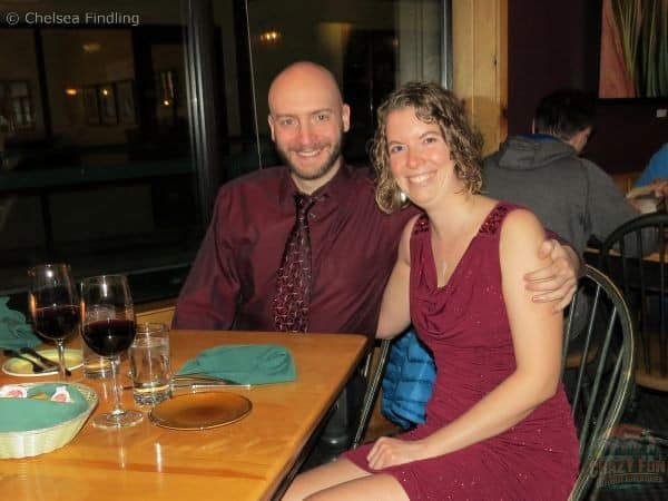 Selfie of two people dressed up in red.