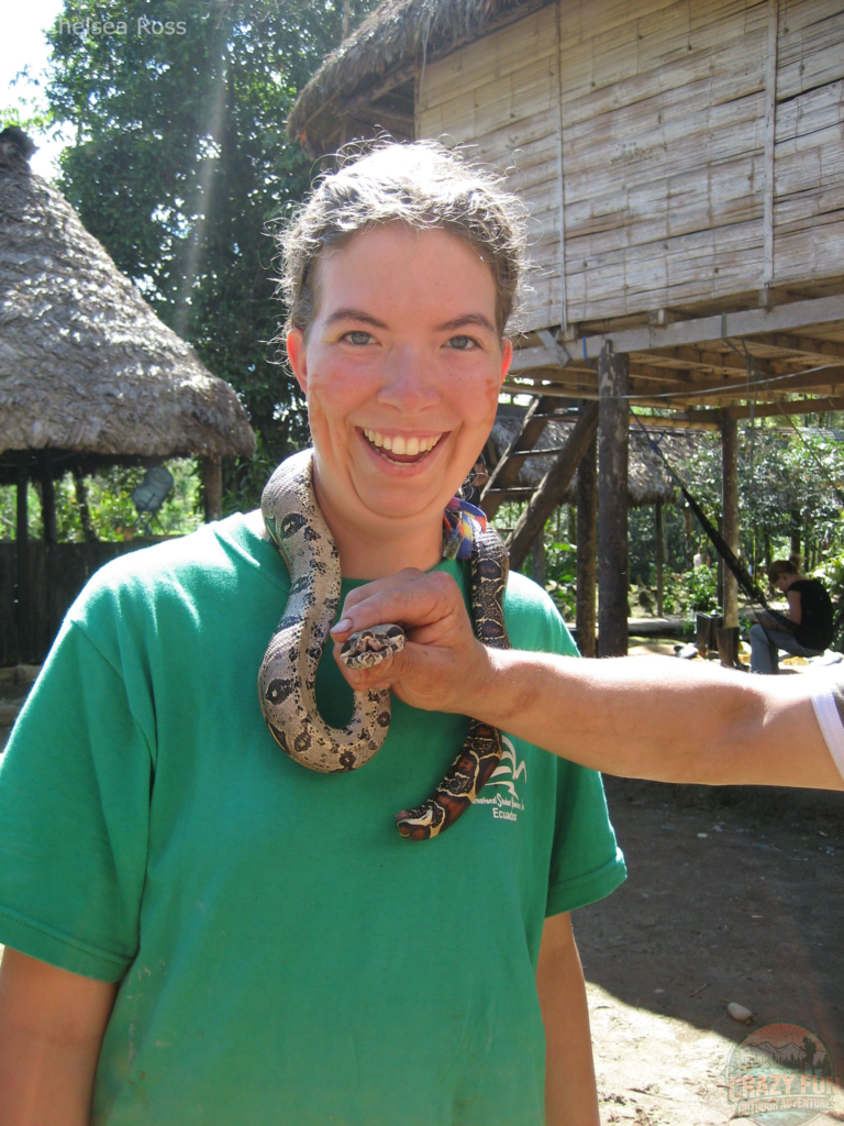Crazy outdoor activities must include wearing a snake around a lady's neck!
