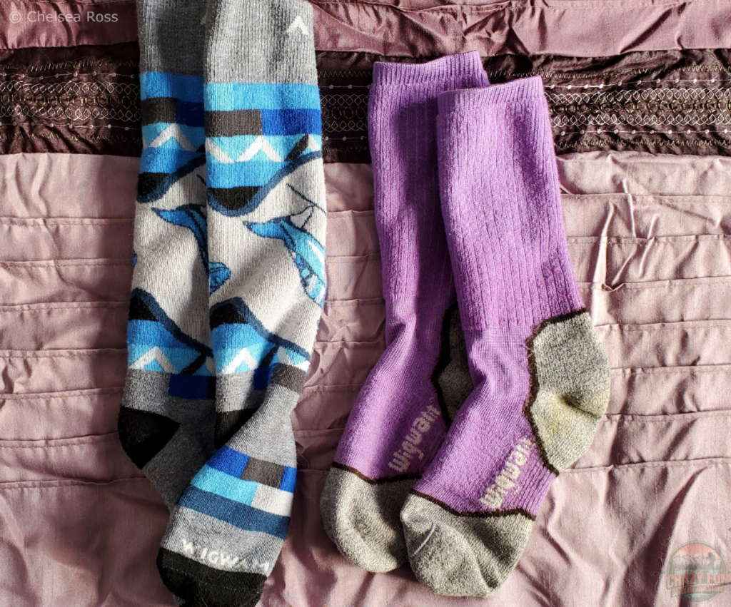 Blue, grey, black socks and purple and grey wigwam socks. Wear them when cross-country skiing.