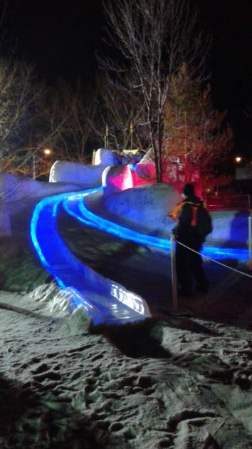 The slide is lit up in blue. 