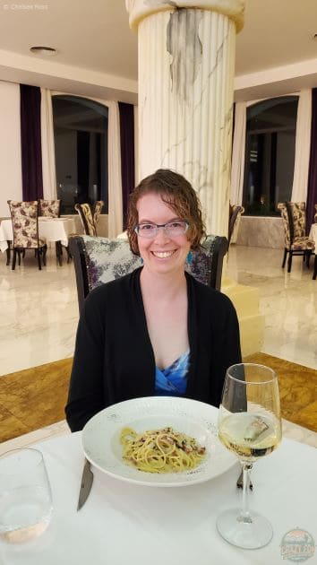 Wearing elegant resort attire at Majestic Mirage while eating at the Italian Restaurant.