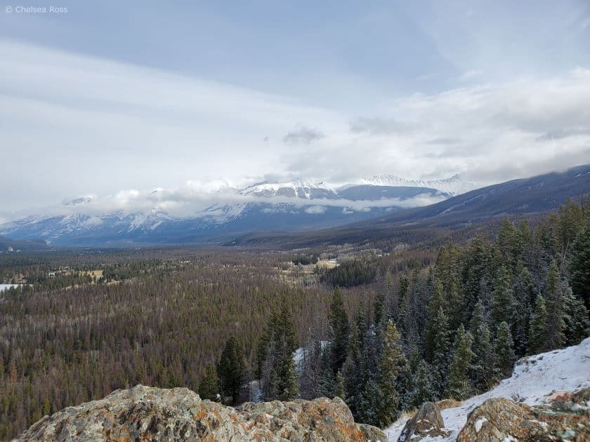 Romantic winter Jasper hikes include going to Old Fort Point. We are looking at the scenery.