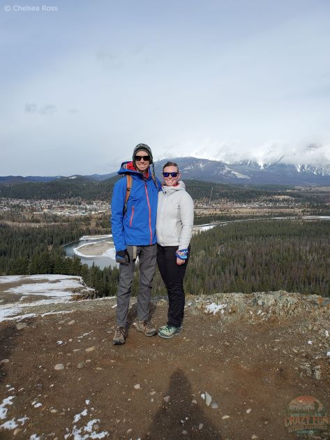 A couple with a beautiful mountain scenery during Old Fort Point hike.