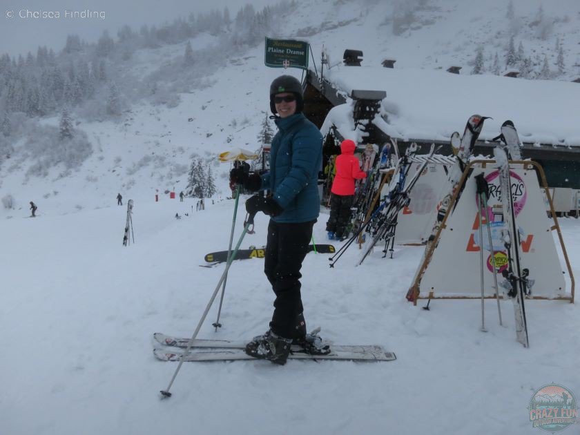 Putting on skis to go downhill skiing in Avoriaz France.