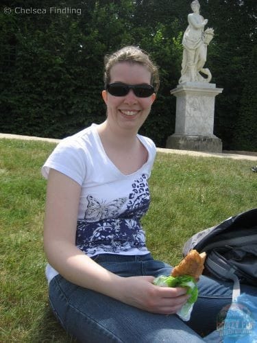 Lady holding a croissant