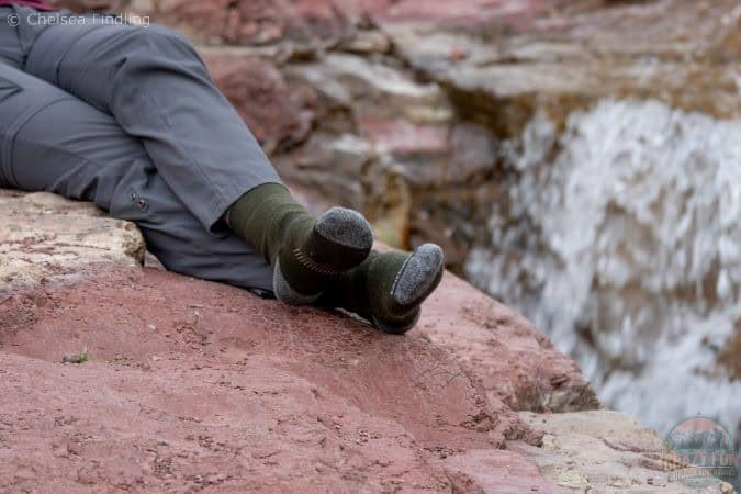 Lady wearing Minus 33 merino wool Crew Socks Mountain Heritage.