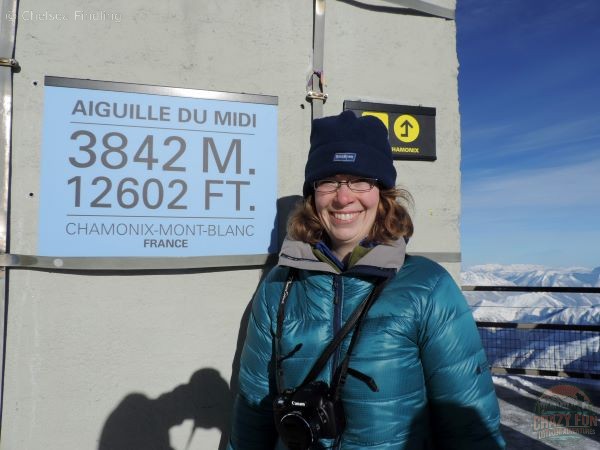 Lady at the top of Aiguille du Midi in winter in Chamonix.