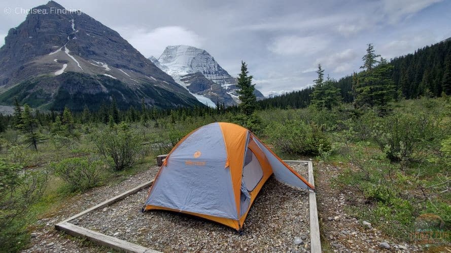 Tent set up at Robson Pass Campground with unobstructed views of Mt. Robson and Rearguard Mountain in the background.