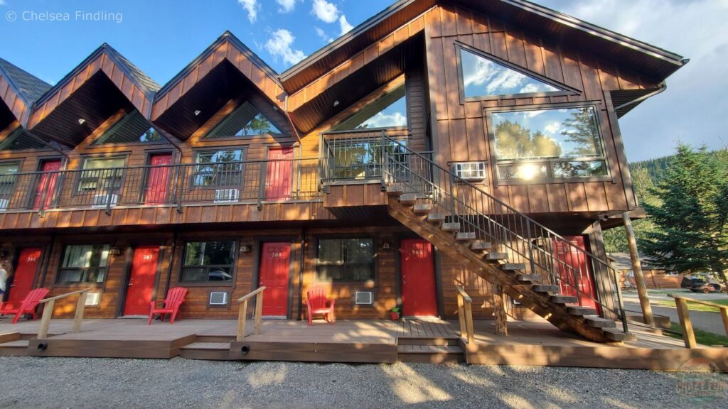 Exterior view of Jasper Gates Resort in the Canadian Rockies showing the hotel building and surrounding outdoor area.
